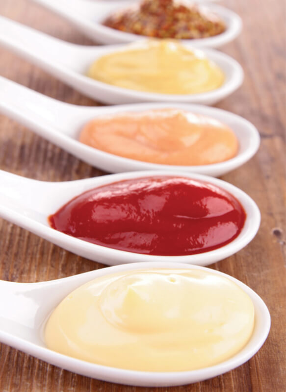 spoonfuls of different natures oils sauces
